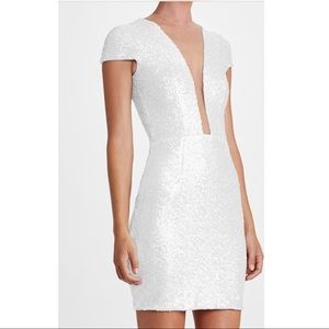 white sequin bodycon low neck dress
